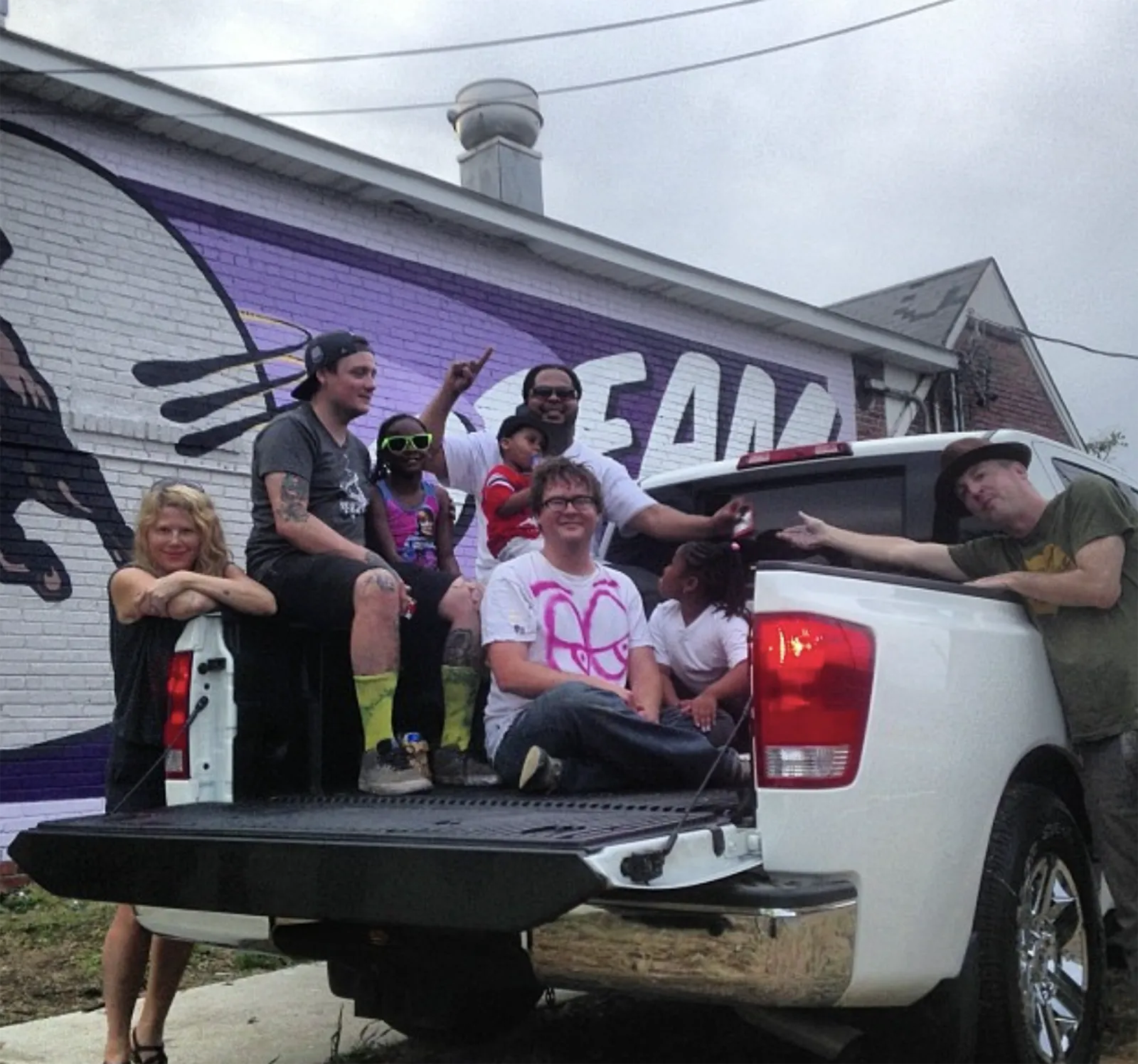 Dream the Unthinkable Mural - Smithfield Neighborhood in Birmingham Alabama - The Paint Crew - wall sign / mural