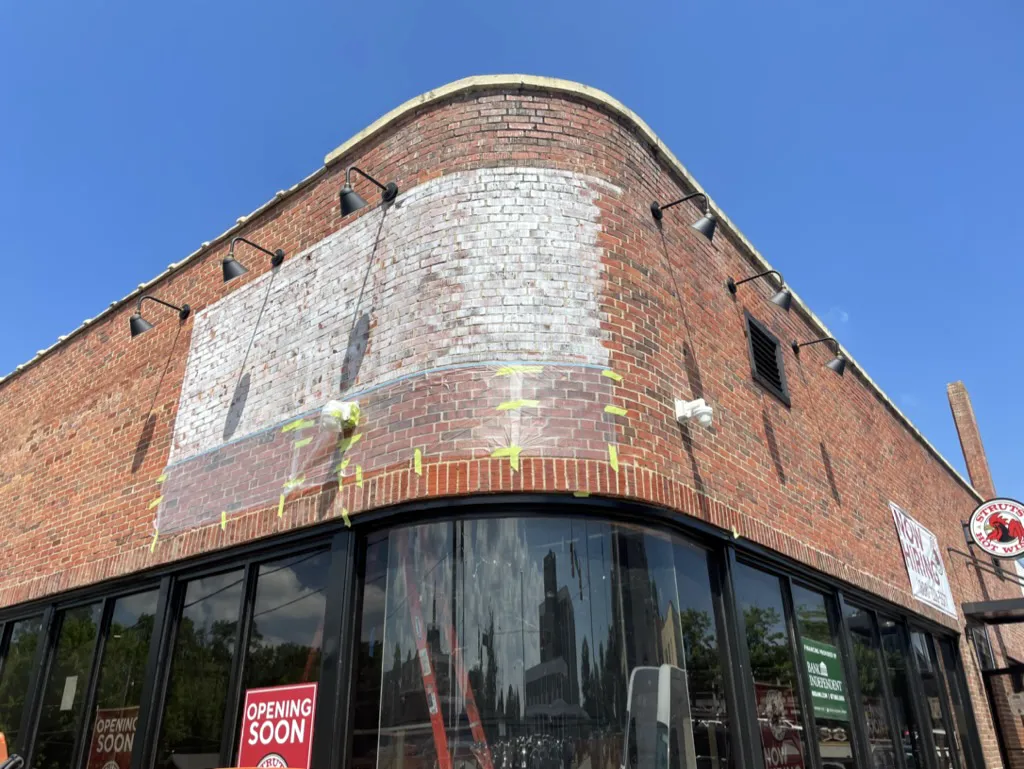 ghost sign - blocking in the white panel - Florence Alabama 